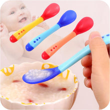 Load image into Gallery viewer, Hot Sale Baby Soft Silicone Spoon Candy Color Temperature Sensing Spoon Solid Feeding Utensils Children Food Baby Feeding Tools